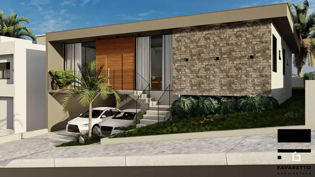 Fachada de uma residência moderna com parede de pedra e grandes portas de vidro.