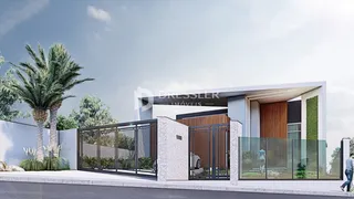 Fachada moderna de uma residência com portão de ferro e jardim em Lajeado.