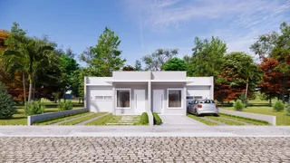 Fachada de uma casa moderna com garagem e jardim em Lajeado, Brasil.