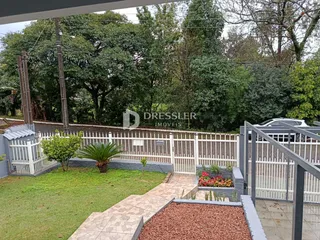 Foto da fachada e quintal de uma propriedade em Lajeado, Brasil.