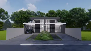 Fachada moderna de uma residência em Lajeado, Brasil, com jardim frontal e garagem.