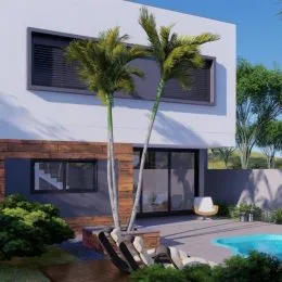 Fachada de uma residência em Lajeado com palmeira e piscina no quintal.