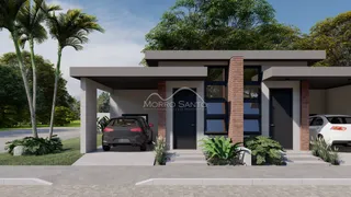Foto da fachada de uma residência moderna em Lajeado, Brasil, com paisagismo frontal.