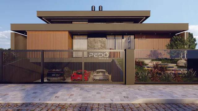 Fachada de uma casa moderna com portão de ferro em Lajeado, Brasil.