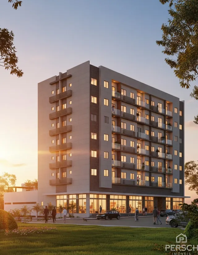 Fachada de um prédio de apartamentos moderno em Lajeado, Brasil, ao pôr do sol.