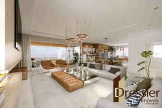 Sala de estar moderna com vista para o mar.
