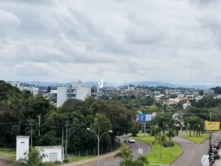 Vista externa de uma propriedade em Lajeado, Brasil, mostrando paisagem e ruas.