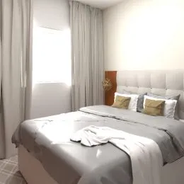 Foto de um quarto com cama de casal e cortinas claras.