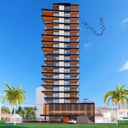 Fachada de um edifício residencial alto em Lajeado, Brasil, sob um céu azul.