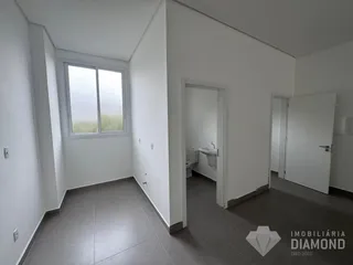Hall de uma propriedade em Lajeado, Brasil, mostrando o interior com piso de cerâmica.