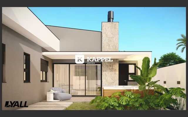 Fachada moderna de uma residência em Lajeado, Brasil, com jardim e área externa.