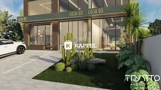 Fachada de um prédio comercial com vitrines e paisagismo em Lajeado, Brasil.