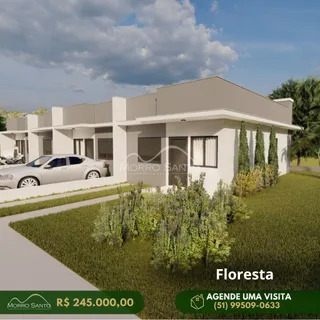 Fachada externa de uma casa moderna em Lajeado, Brasil, com jardim frontal.