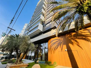 Fachada moderna de um edifício residencial em Lajeado, Brasil.