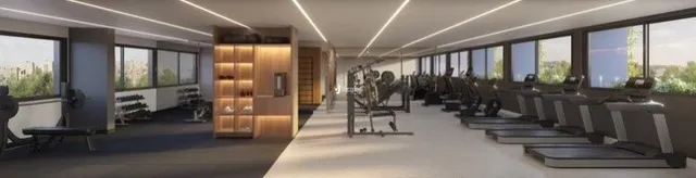Imagem de um espaço interno com equipamentos de ginástica.