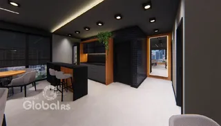 Ambiente moderno com cozinha e sala de jantar em um imóvel.