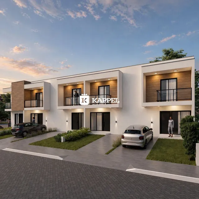 Fachada moderna de um imóvel residencial em Lajeado, Brasil, com detalhes em madeira e varandas.