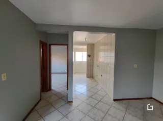 Hall de entrada com piso de cerâmica.
