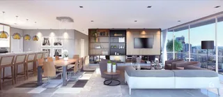 Sala de estar com área de jantar e cozinha em um imóvel em Lajeado.