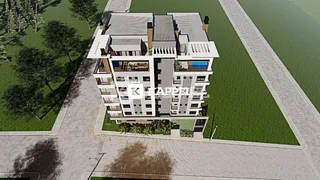 Fachada de um prédio residencial moderno com terraços em Lajeado, Brasil.