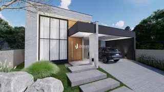 Fachada moderna de uma residência em Lajeado, Brasil, com jardim frontal.
