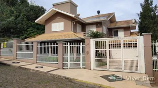 Casa com 4 dormitórios, foto 1