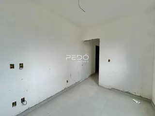 Vista interna de um corredor de imóvel em Lajeado, Brasil.