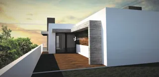 Fachada moderna de uma residência em Lajeado com deck de madeira.