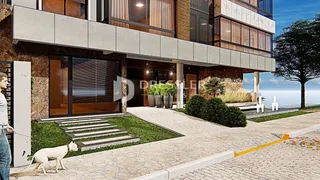 Fachada moderna de um imóvel em Lajeado, Brasil, com jardim e área externa.