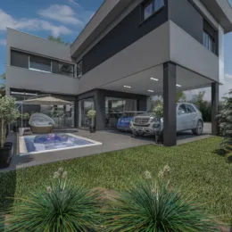 Fachada de uma casa moderna em Lajeado com piscina e jardim.