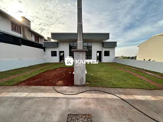 Fachada de uma residência com jardim em Lajeado, Brasil.