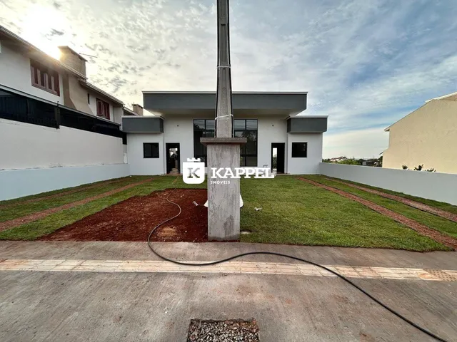 Fachada de uma residência com jardim em Lajeado, Brasil.