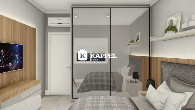 Quarto com cama de casal e painel de madeira na sala de um imóvel.