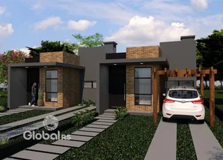 Fachada moderna de uma residência em Lajeado, Brasil, com jardim e entrada.