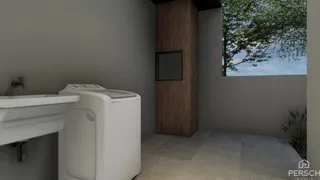 Foto de um ambiente interno mostrando uma pia e um aquecedor de água.