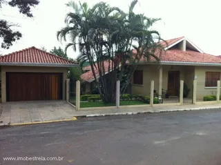 Casa com 4 dormitórios, foto 1