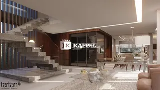 Sala de estar moderna com escadaria e revestimentos em madeira.