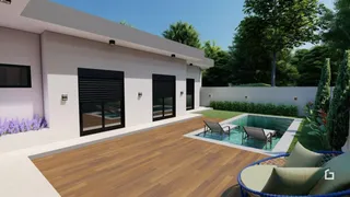 Fachada de uma casa moderna com piscina e jardim.