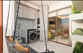 Ambiente moderno com cozinha e área de estar em um apartamento.
