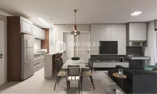 Uma sala de estar moderna com armários brancos e detalhes em madeira.