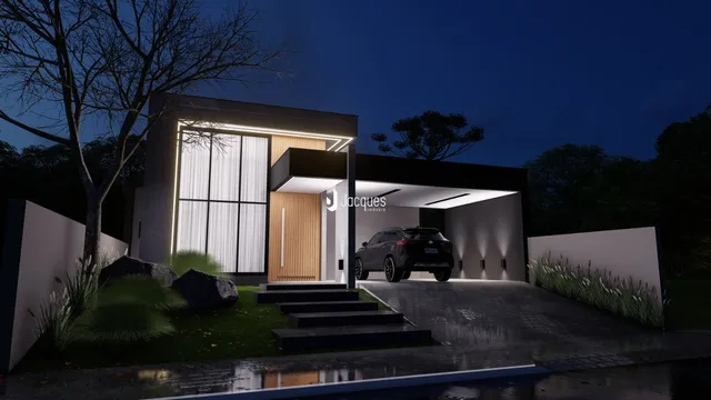Fachada moderna de uma residência em Lajeado, Brasil, à noite.