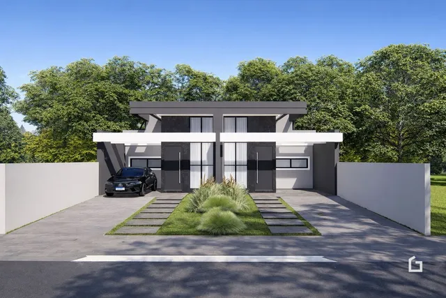 Fachada moderna de uma residência em Lajeado, Brasil, com jardim e entrada.