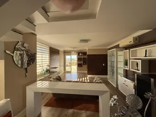 Sala de estar com piso de madeira e decoração moderna.