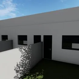 Vista externa de uma parede branca de uma residência em Lajeado.