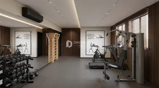Interior de uma academia moderna com equipamentos de ginástica.