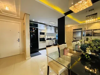 Ambiente moderno de sala e cozinha em um imóvel no Brasil.