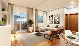 Sala de estar moderna com vista para o mar.