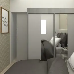 Quarto com cama e armário em ambiente interno.