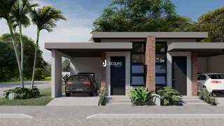 Fachada de uma residência moderna com jardim em Lajeado.