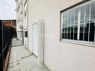 Vista externa de uma parede e acesso de um imóvel em Lajeado.
